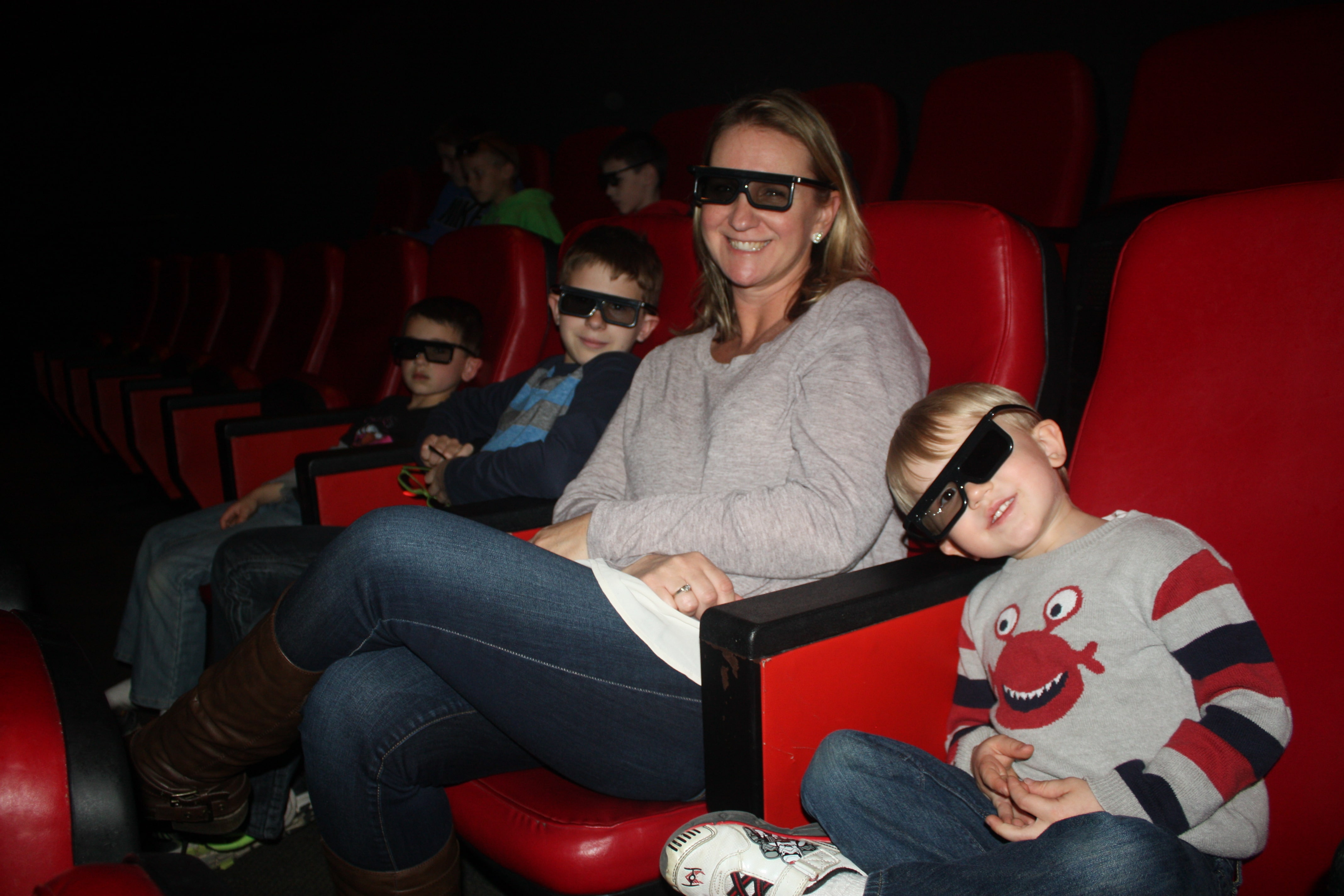 Family watching 3D movie