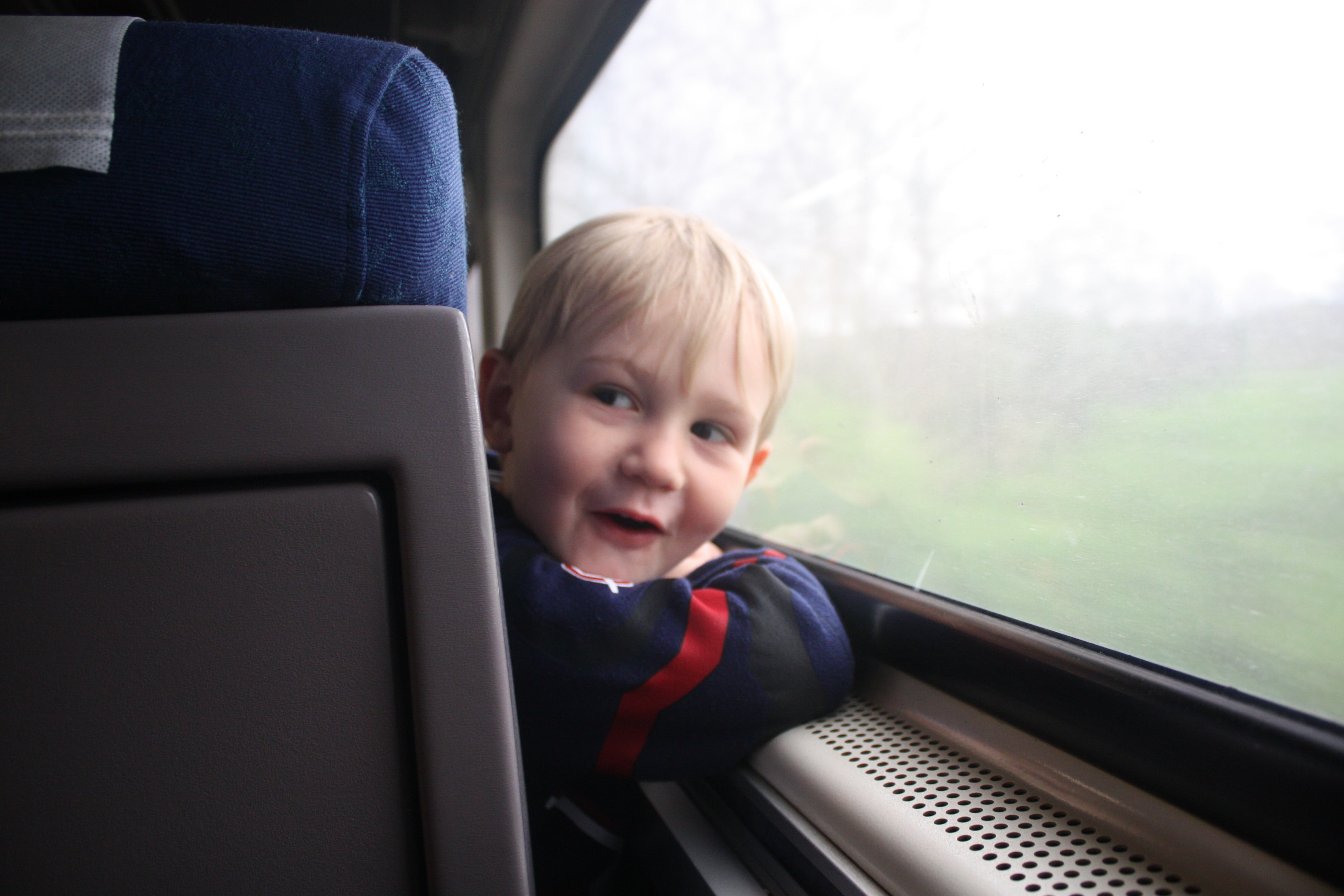 boy looking out of train window